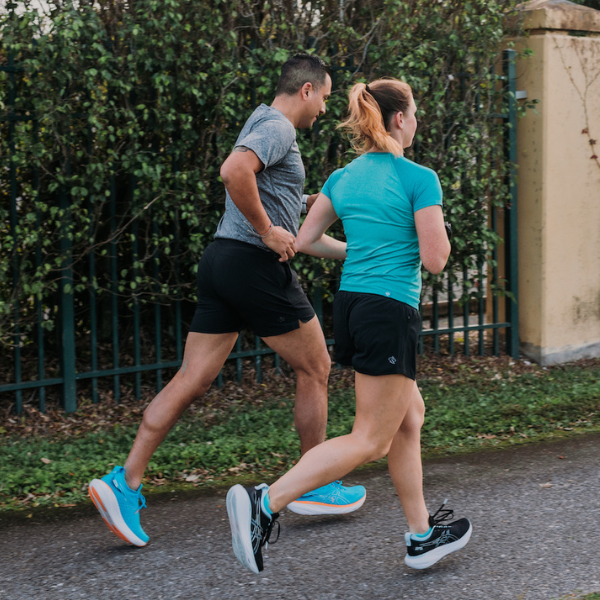 Man and woman running together